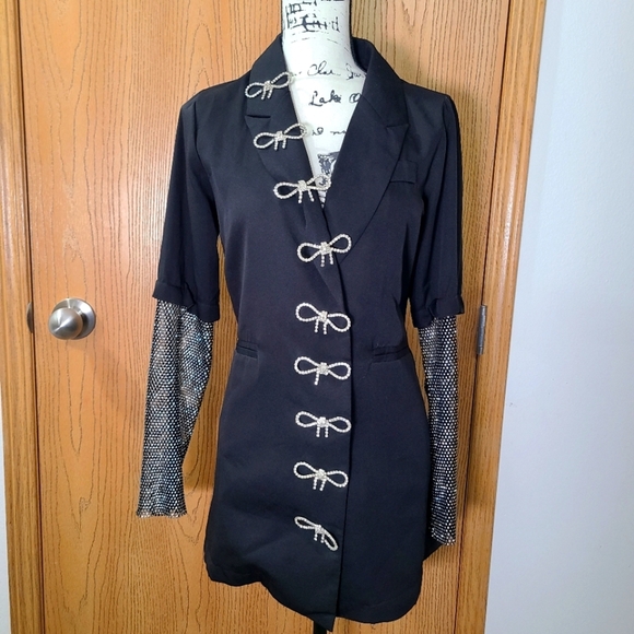 Glamorous black blazer with rhinestone netting sleeves and bow accent collar - Picture 1 of 3